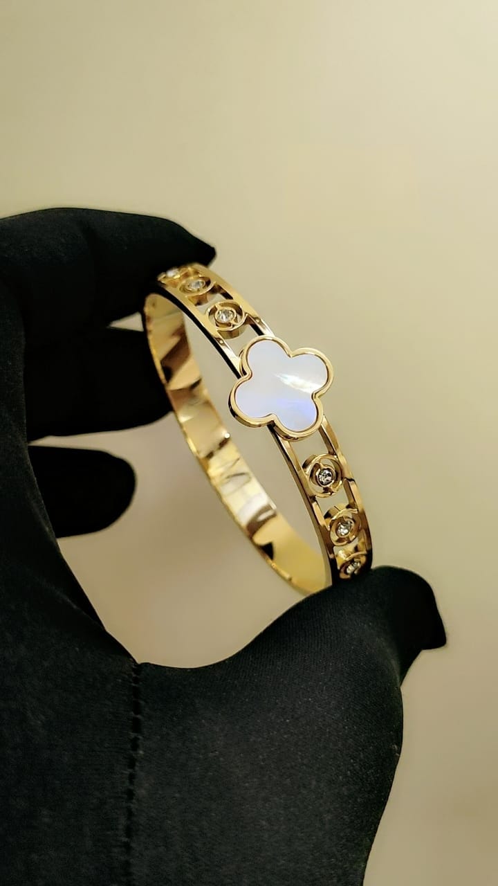 Luxury Gold Bangle with Embedded Gemstones