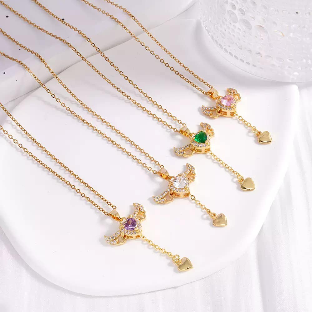 Gold Bird Pendant Necklace – Sparkling Stone with Heart Drop Charm