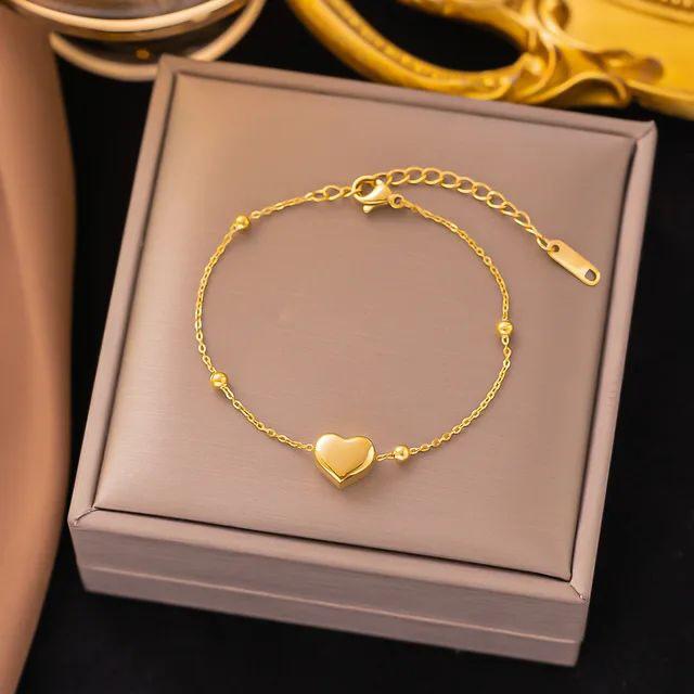Elegant Gold Heart Jewelry Set – Bracelet, Earrings & Necklace