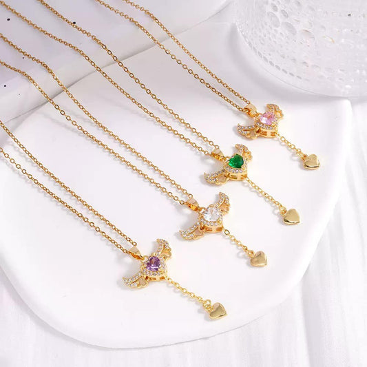 Gold Bird Pendant Necklace – Sparkling Stone with Heart Drop Charm